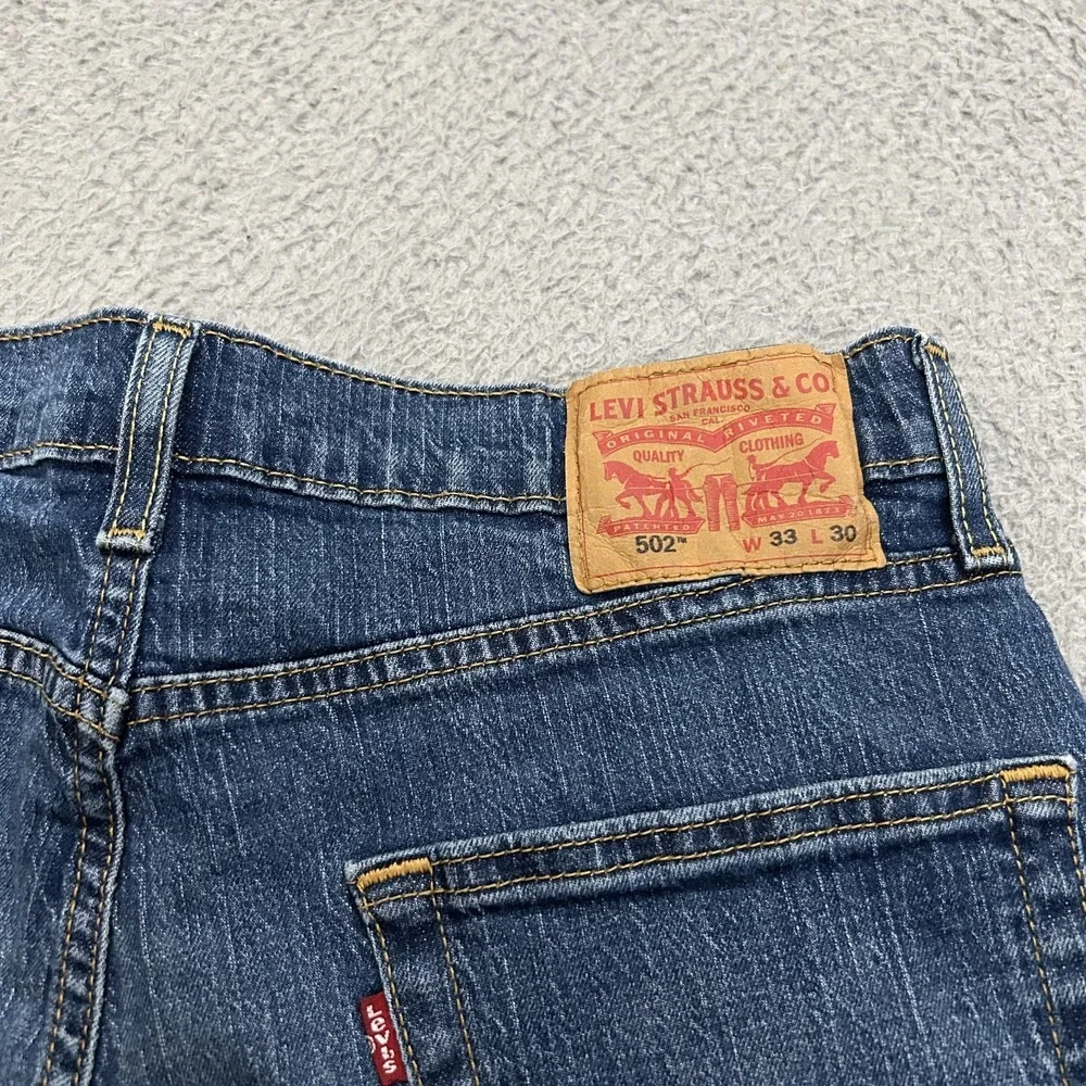 Levis Jeans Mens 33x30 Blue Denim 502 Tapered American Stretch Medium Wash Adult
